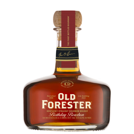A bottle of Old Forester Birthday Bourbon – 2018 Release, showcasing its signature round decanter-style design, deep amber whiskey, and a special label marking its historic bottling at the new Old Forester Distilling Co.